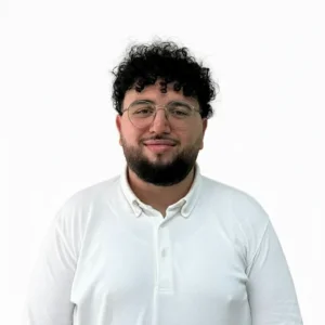 French tutor Sofiane smiling during a language lesson in Hong Kong