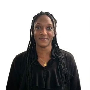 Native French teacher conducting an interactive language class with diverse students in Hong Kong