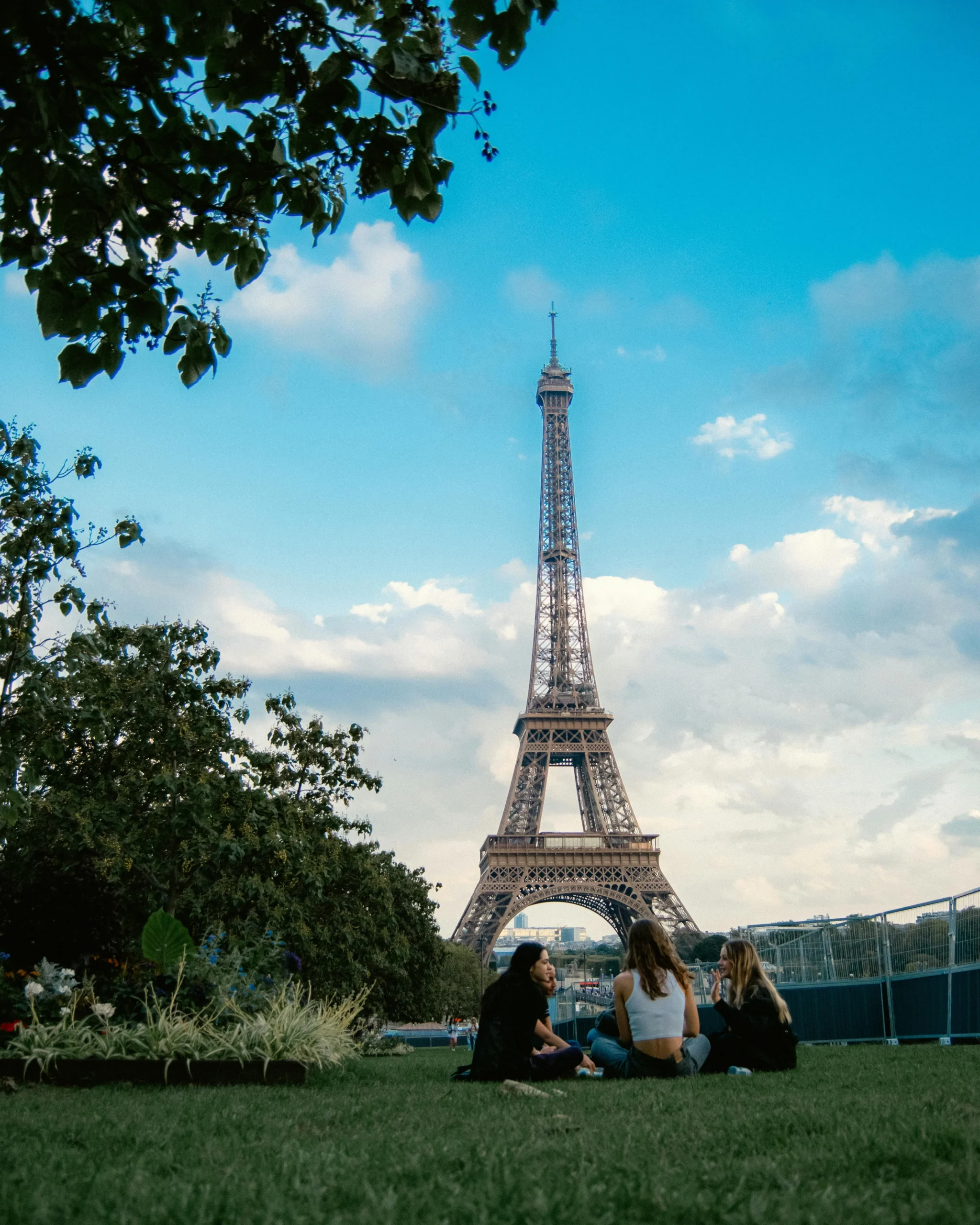 Student writing French vocabulary in a notebook during a language lesson at Interactive French Hong Kong